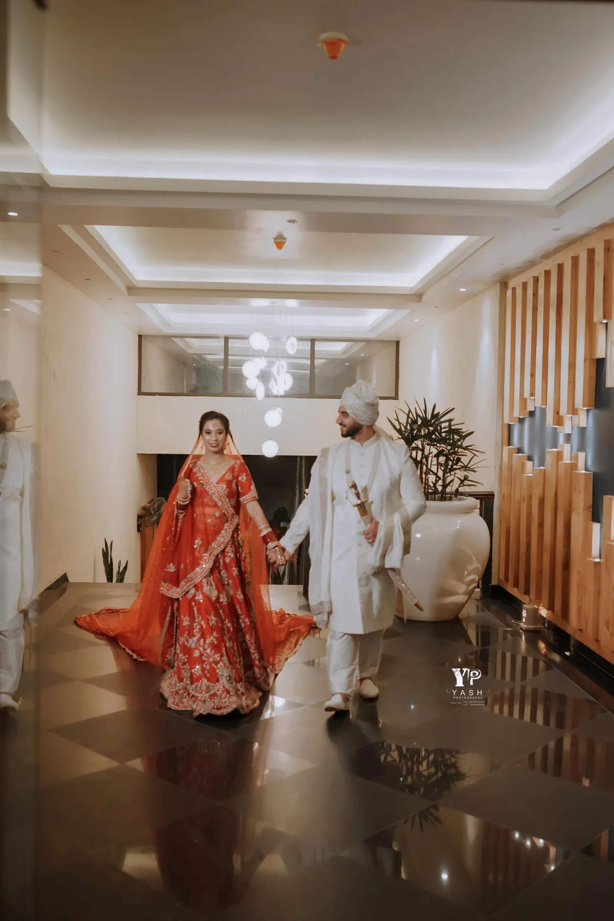Bride and groom walking hand in hand